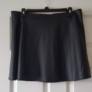 Black faux leather mini skirt
